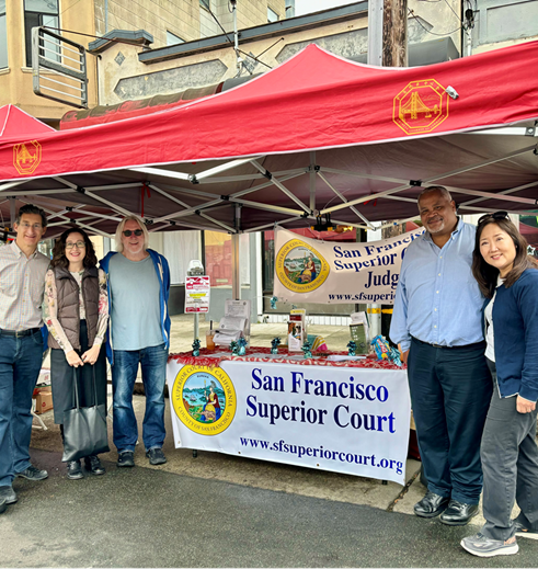 Judges staffed a booth to provide information to the public at the Richmond Night Market.